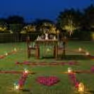 Private Open-Air Dining Setup With Candles And Rose Petals Is Mesmerising