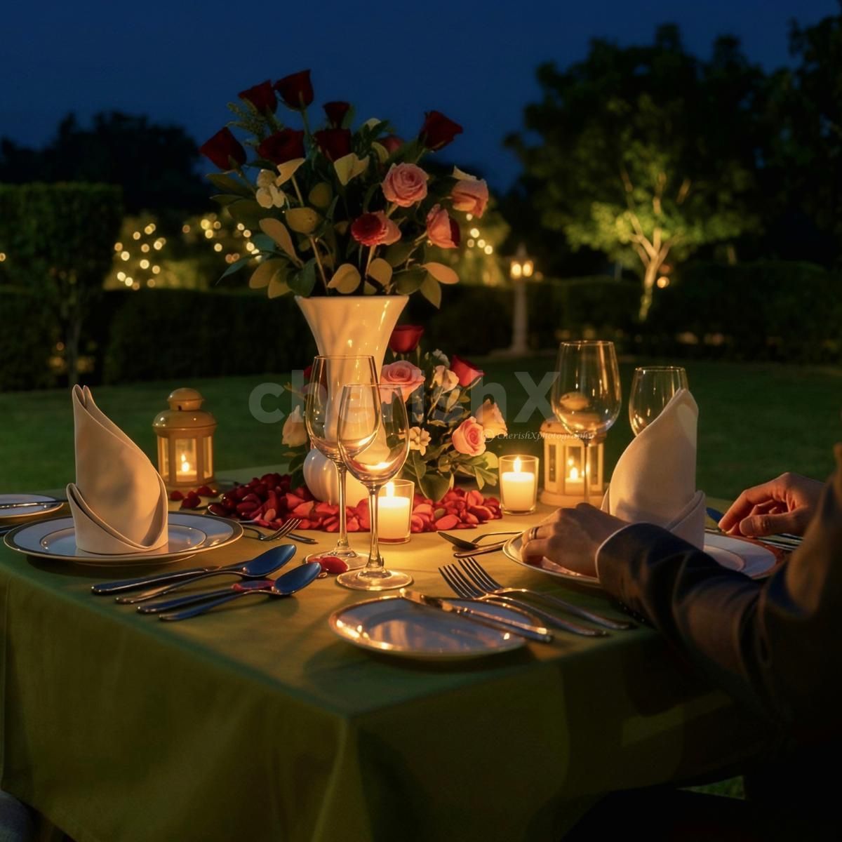 Beautiful Outdoor Dinner Setup With Soft Lights And Greenery Creates Lifetime Memories