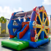 A classy Ferris wheel bouncy house can be installed on a large open space.
