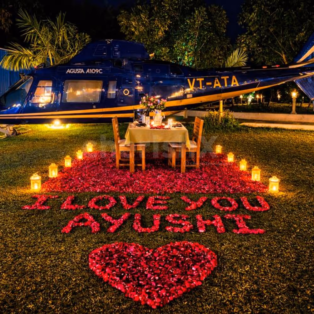 Romantic Candlelight Dining Setup With A Chopper Theme For Couples