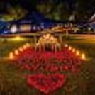 Romantic Candlelight Dining Setup With A Chopper Theme For Couples