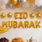 Eid Mubarak Foil text balloon underneath the arch grabs attention with its grace