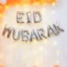 A Pastel Peach, White, And Metallic Rose Gold Balloon Arch Highlights Eid Vibes.