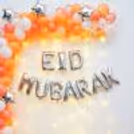 Eid Mubarak decor setup features a 6 m net fabric backdrop