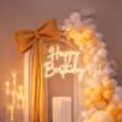 The Giant Satin Bow, along with the arch, radiates a gift-wrap feel during the birthday celebration.