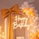 Paper cake table and smokeless candles on a stand add to the magical look with their grace.