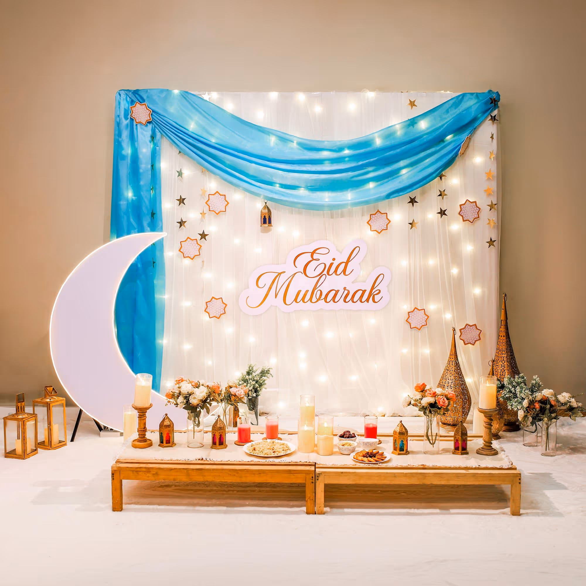A giant sunboard backdrop looks well decorated with fabric drapes in dual colors.