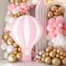 Artificial flowers in the baby shower decor add colors and natural elegance.