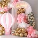 The OH Baby neon light adds the needed glow to the setup, focusing on the reason for the celebration.