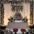 Photo Frame Decorated With Flowers For A Peaceful Tribute Setup