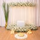 Pot With Long Green Grass And White Loose Petals Incorporates The Natural Feel