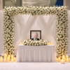 A3 Photo Frame, Placed Against A White-Flower Backdrop With Soft Draping, Creates A Peaceful Remembrance Setup.