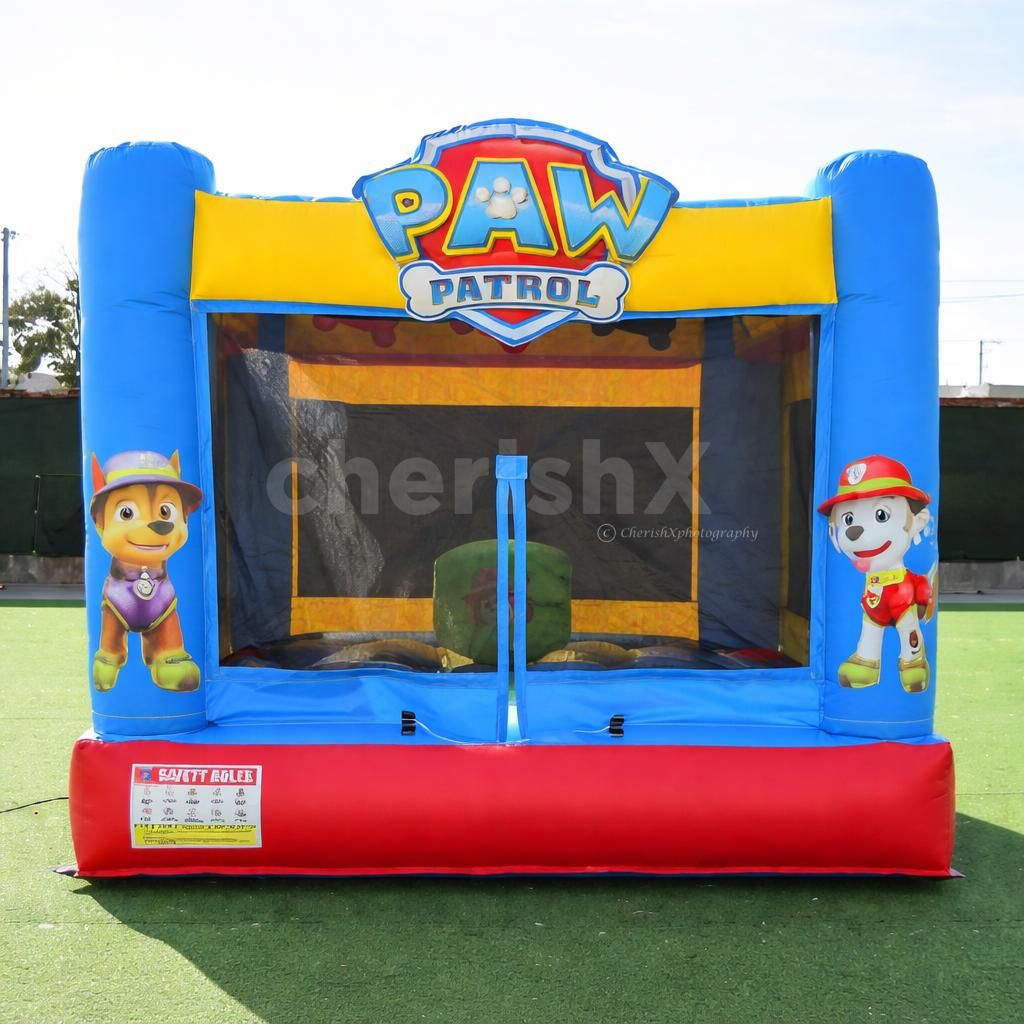 Bright Paw Patrol themed bouncy house with colorful inflatable setup for kids' party