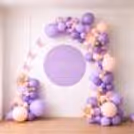 A Balloon Arch With A Teddy, A Moon Balloon, And Oh Baby Foil Letters Forms A Beautiful Baby Shower Setup.