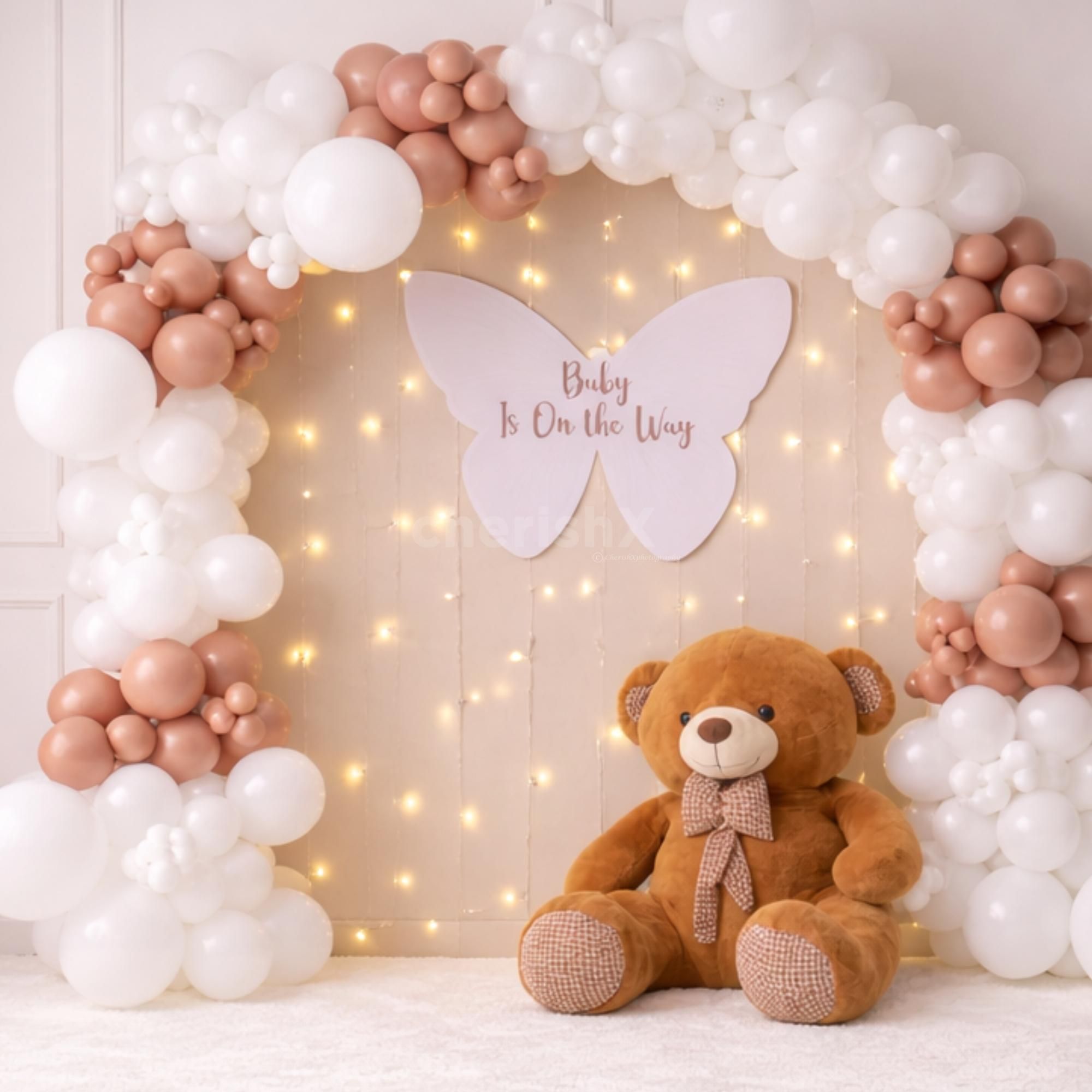 Soft-Tone Themed Baby Shower Setup With Pastel Balloons And A Cute Teddy