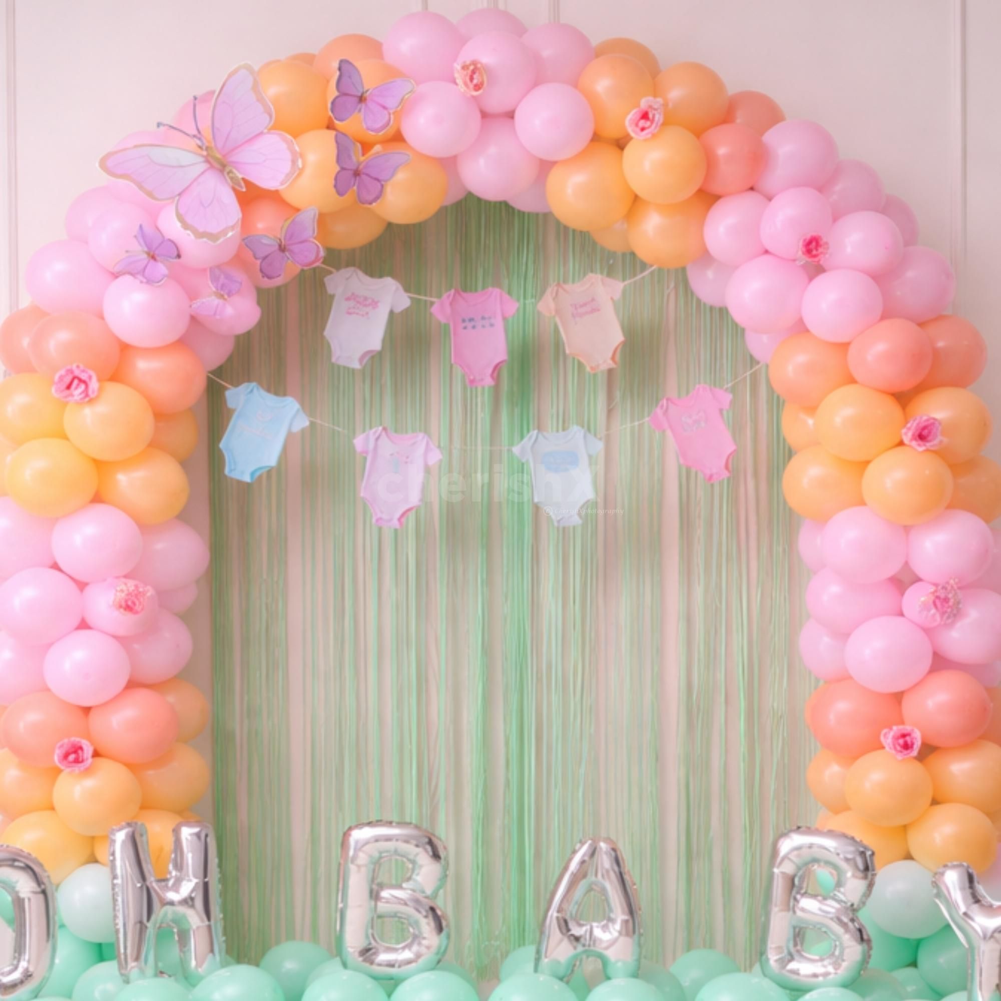 Artificial Pink Roses Add Softness And Elegance To The Setup Of The Baby Shower Celebration