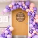 Pastel Purples Evoke Playfulness In The Balloon Arch Backdrop And Draw Immediate Attention.