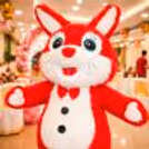 A Joyful Red Bunny Roams The Venue For 3 Hours, Playing With Kids.
