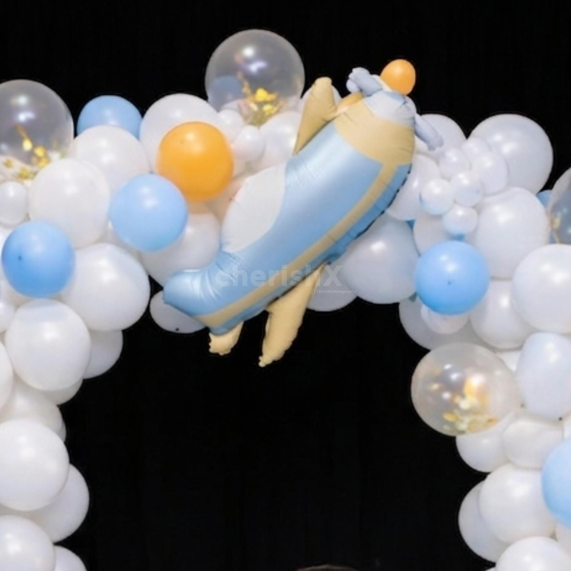 Aeroplane Foil Balloon Placed In The Center Of The Pastel Balloon Arch Adds Uniqueness
