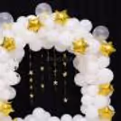 A Breathtaking White Latex Balloon Arch, Perfect For A Half-Birthday Party.