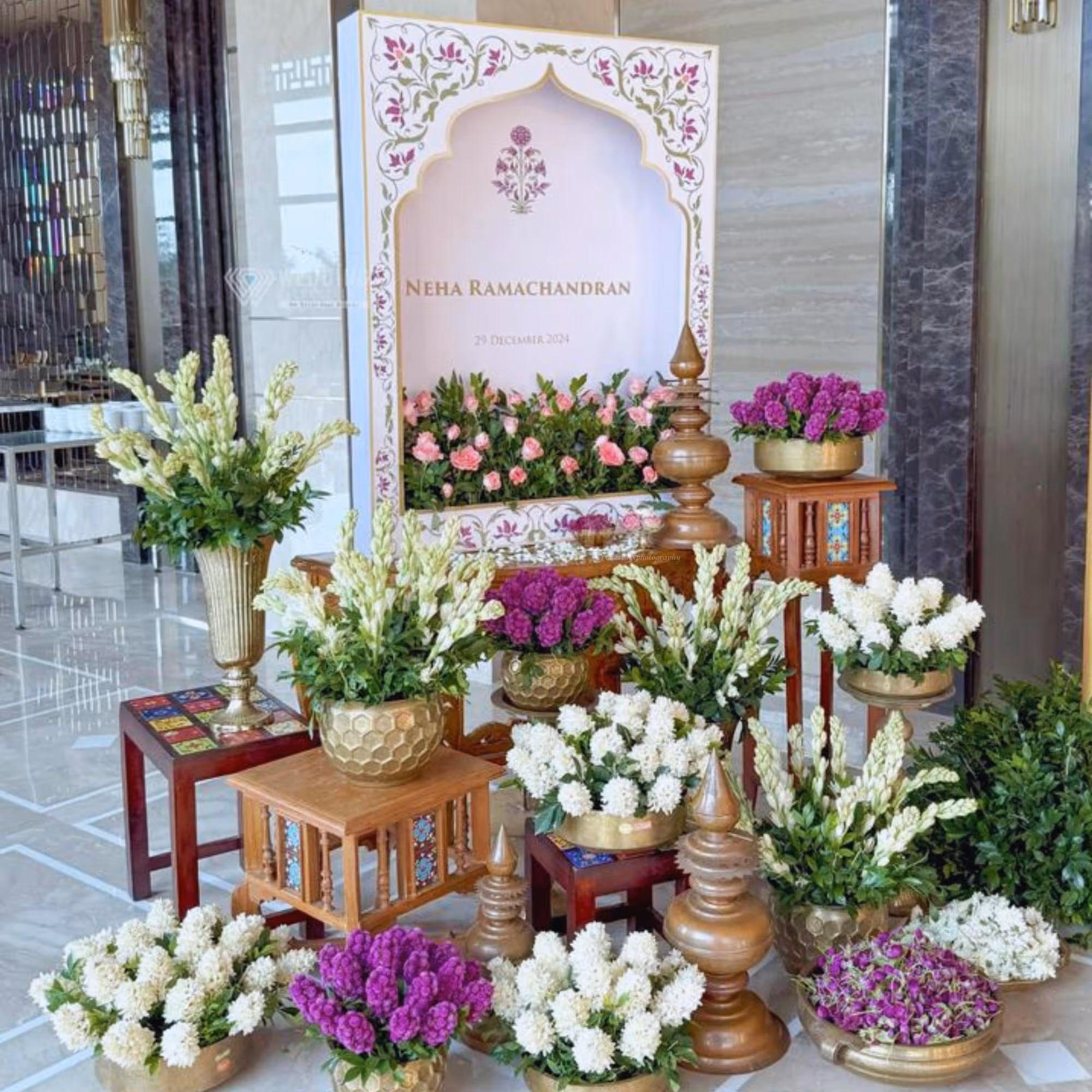 Fresh-Flower Entrance Decorations Enhance The Auspiciousness Of The Griha Pravesh Ritual.
