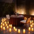 Create the perfect proposal setting with candles, fairy lights and a “Marry Me” neon sign.