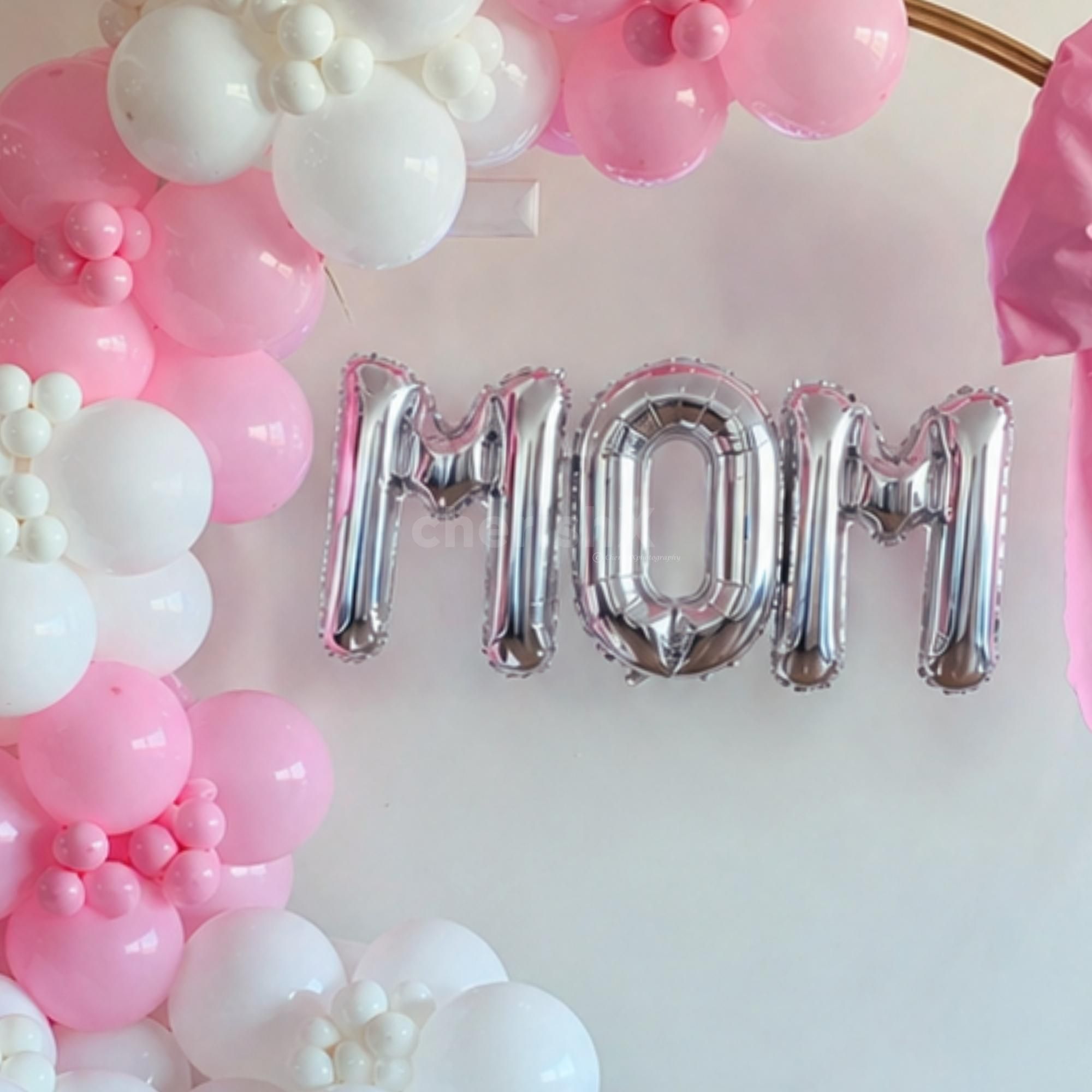 The Silver Mom Foil Balloon within the ring attracts and makes Mother's Day decor perfect.