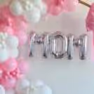 The Silver Mom Foil Balloon within the ring attracts and makes Mother's Day decor perfect.