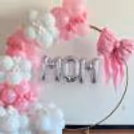The Oversized pink bow adds a mesmerising, feminine touch to the Mother's Day decor