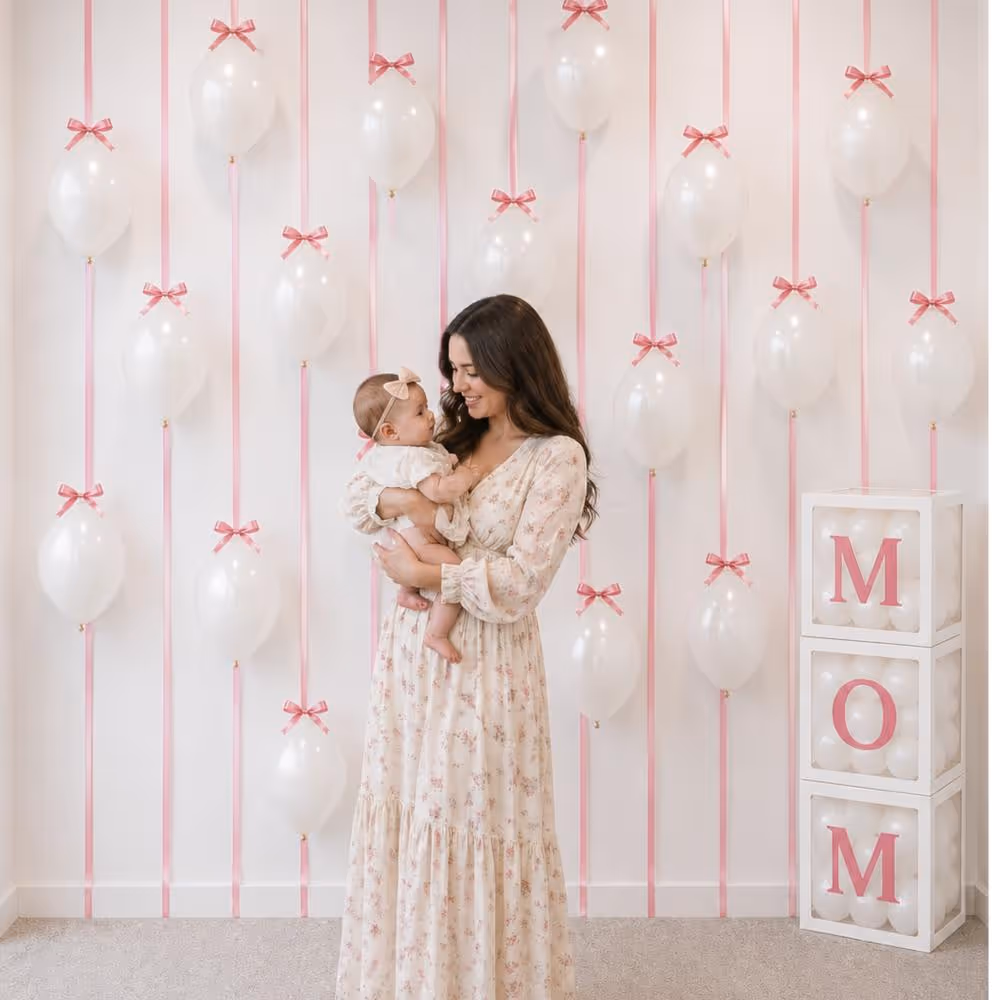 White Latex Balloons On The Wall And In Boxes Add Serenity To The Ambience With Their Softness