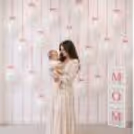 White Latex Balloons On The Wall And In Boxes Add Serenity To The Ambience With Their Softness