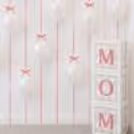 Pink Bows And Ribbons On The Wall Frame The Backdrop For Selfies On Mother's Day