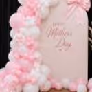 Oversized Pink Bow And Handmade Ribbon Bows Add Dimensions In The Decor With A Gift Feel.