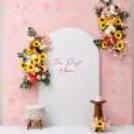 A Flex Backdrop With A Sunboard Stand Decorated With Artificial Floral Bouquets Looks Amazing.
