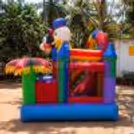 Turn A Kid's Birthday Party Into A Mini Disneyland With A Mickey & Donald-Themed Bouncy Setup.