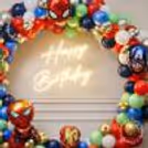 A Multi-Coloured Balloon Arch Clustered On The Pillar Creates A Powerful, Impactful Effect.