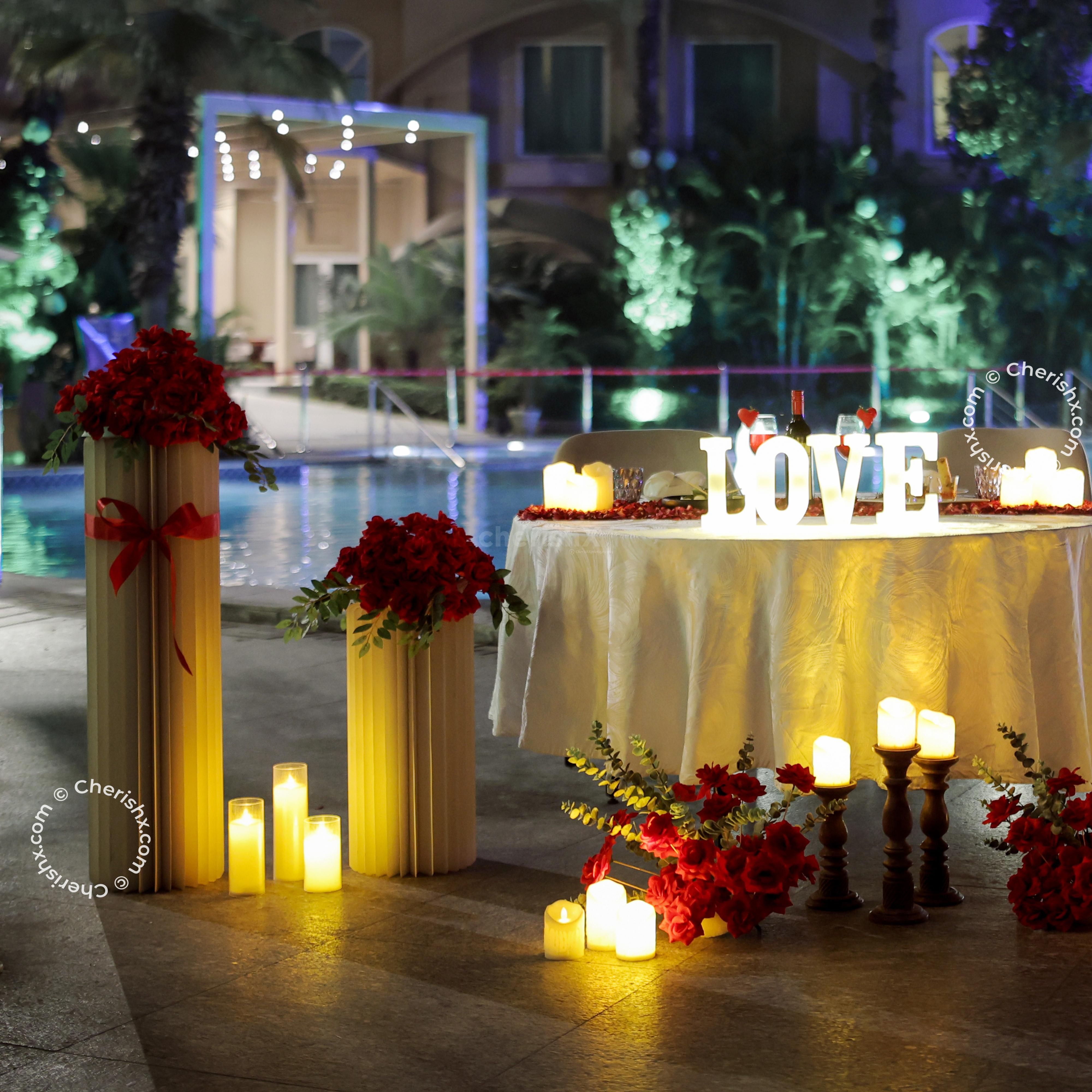 Candles and rose petals make an intimate, romantic atmosphere.