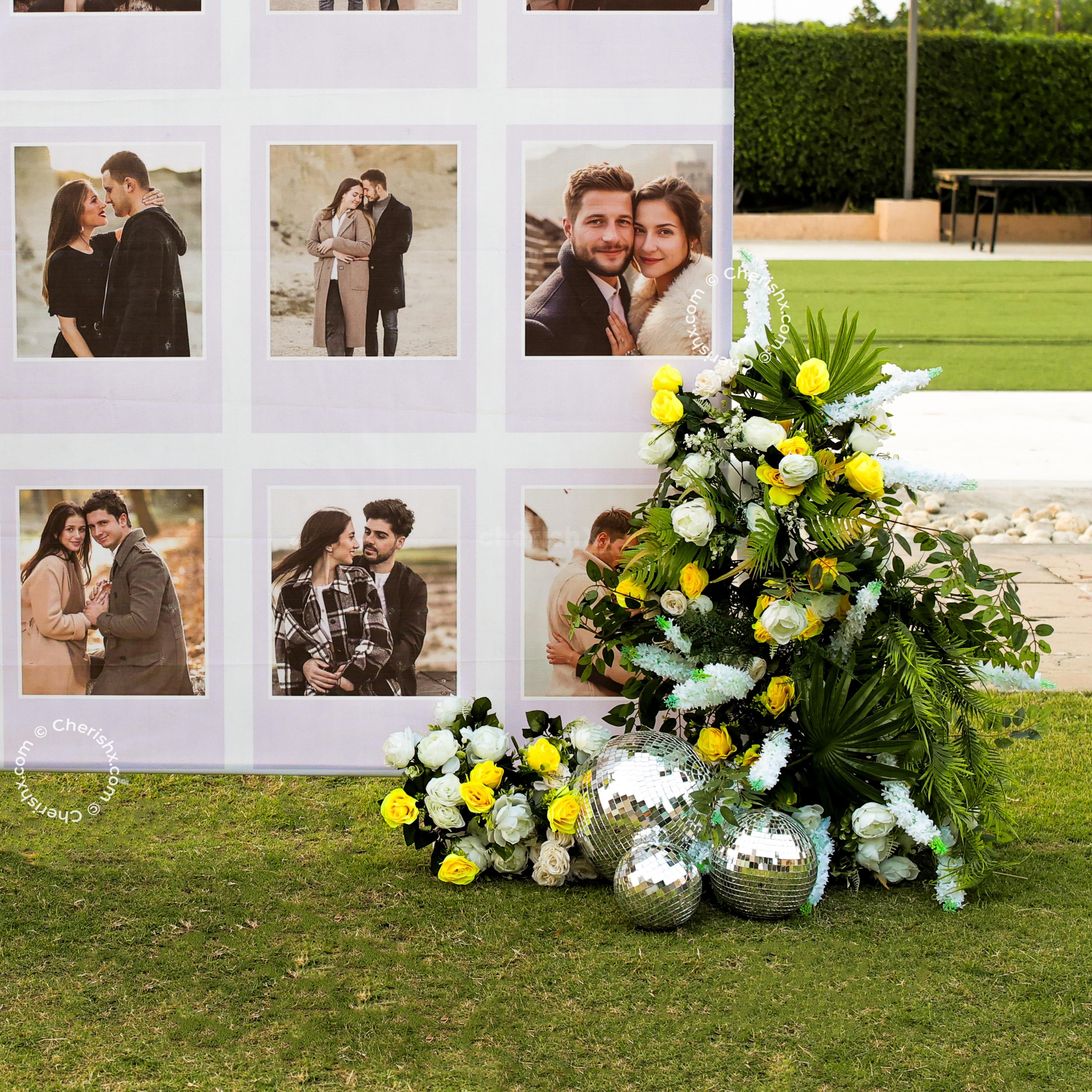 Customized flex on a stand with floral channels creates a beautiful backdrop.