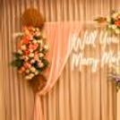 Luxurious Artificial Flowers And Palm Leaves Keep The Freshness Intact In This Proposal Decor.