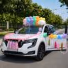 A Sea Of Pastel Balloons On The Car Announces The Cheerful Welcome Of The Baby As A New Member.