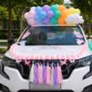 Colourful Combination Of Paper Tassels On The Car Sways For Baby Arrival In Home