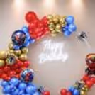 Free-Floating Balloons Add Motion To The Setup, Organically Complementing The Theme