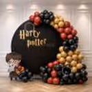A Big Balloon Arch Adds Sparkle To The Kids' Birthday Party, Making The Setup Apt For Cute Photos.