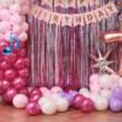 Themed Paper Cutouts On The Balloon Arch Around The Curtain Add A Premium Look To The Decor