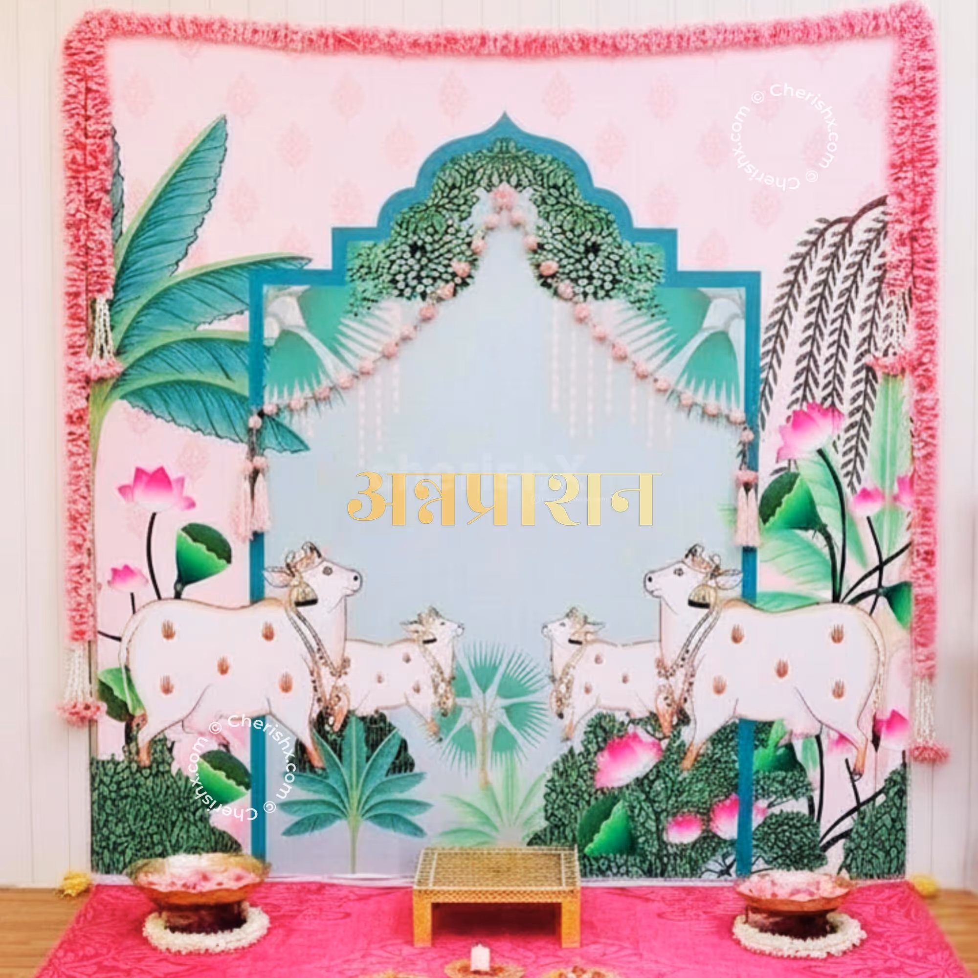 Charming Baby Ceremony Setup That Uses A Natural Feel In Its Creation, Like Flowers, Garlands, And Tassels.
