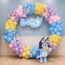 A colorful Bluey-themed birthday ring decor adds a playful touch to the celebration.