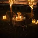 Celebrate love under the stars with CherishX’s open-air candlelight dining experience, beautifully styled with flowers, candles, fairy lights, and a serene stable-side view.