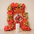 The Flash Birthday Party Setup Including Themed Backdrop, Balloon Styling, Party Accents and  Age Display