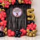Add a Happy Birthday to a round fringe curtain with black foil and a Flash design.