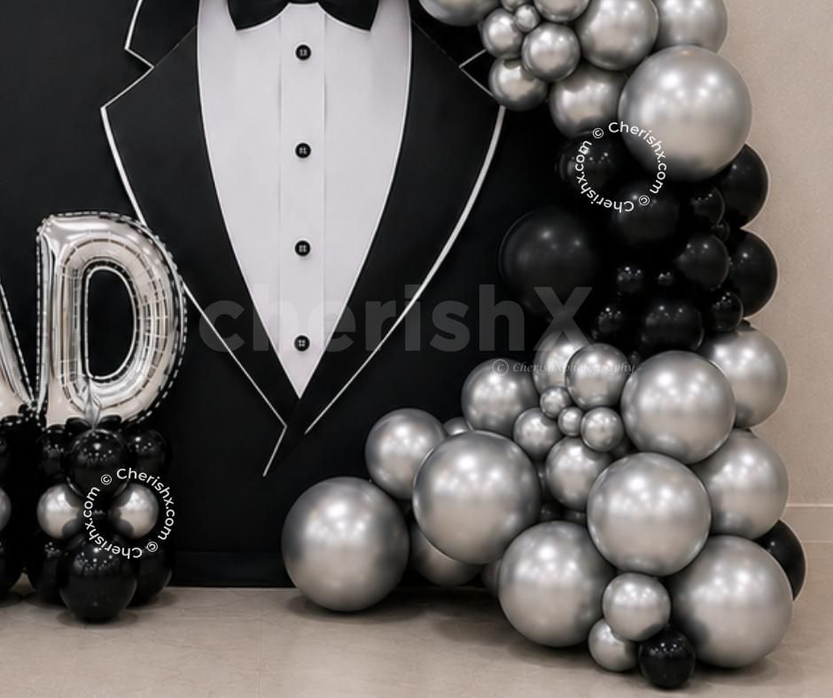 Trendy Set With Metallic Clusters On A Tuxedo Theme Party Backdrop.